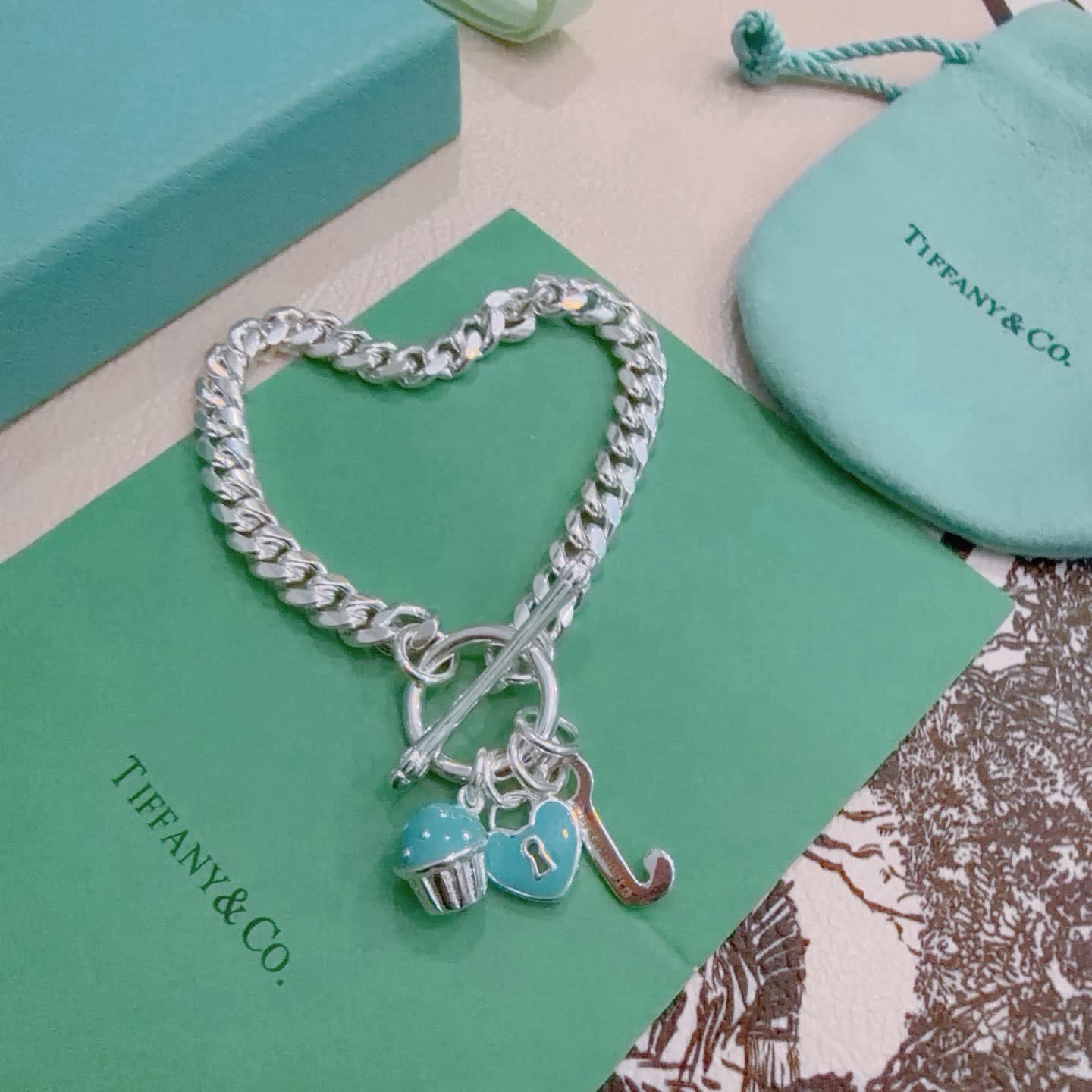 Tiffany & Co. Sterling Silver Heart Bracelet with Charms